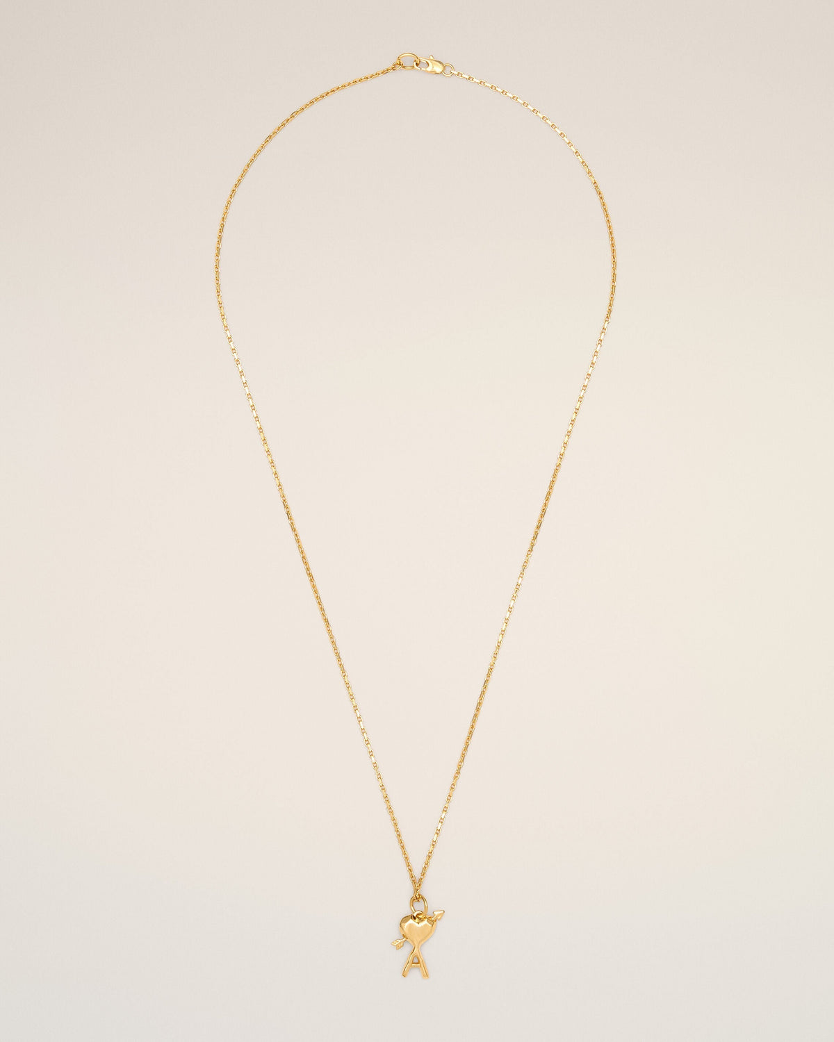 Gold brass necklace with hammered Ami de Coeur arrow