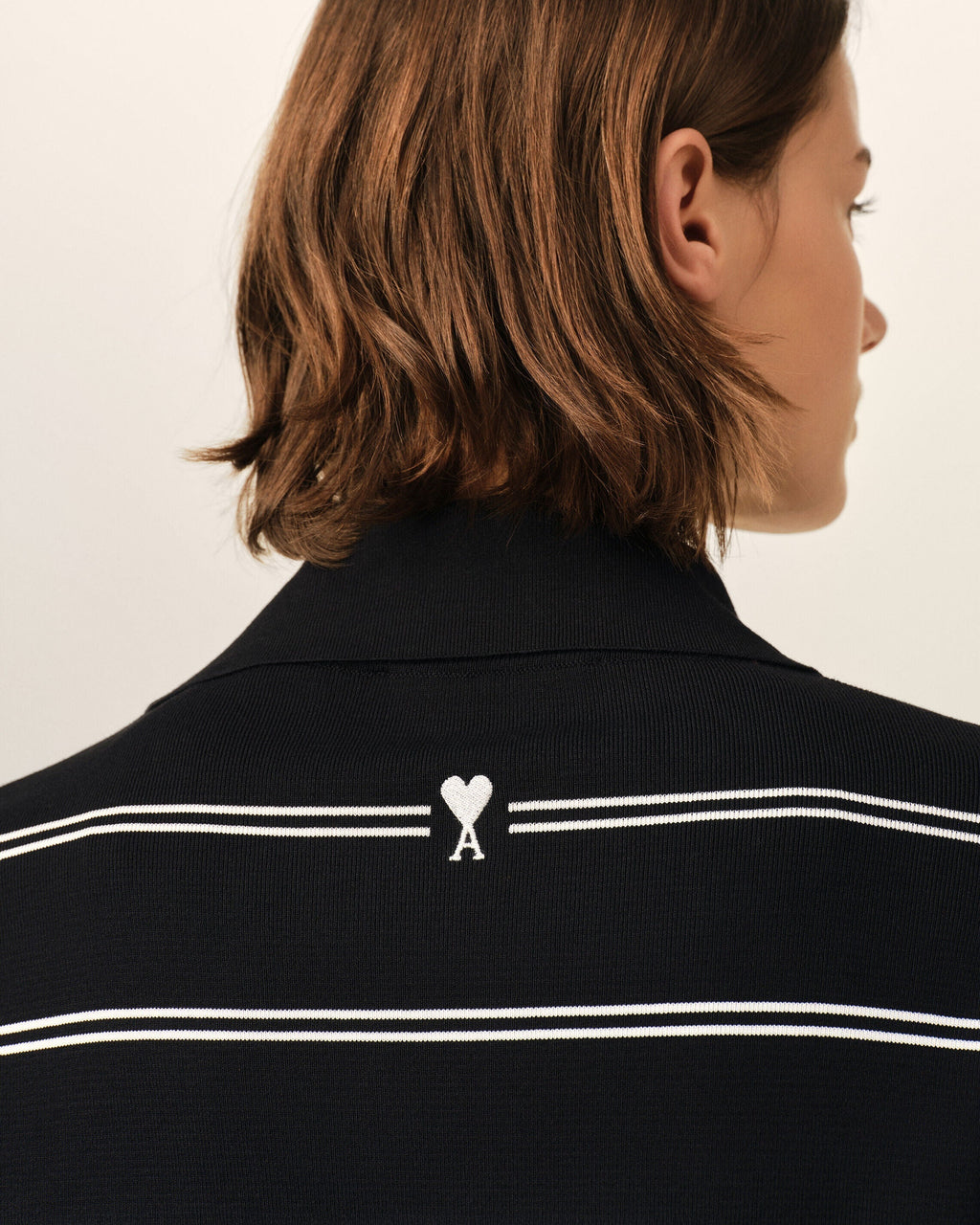 Black striped cotton polo with Ami patch
