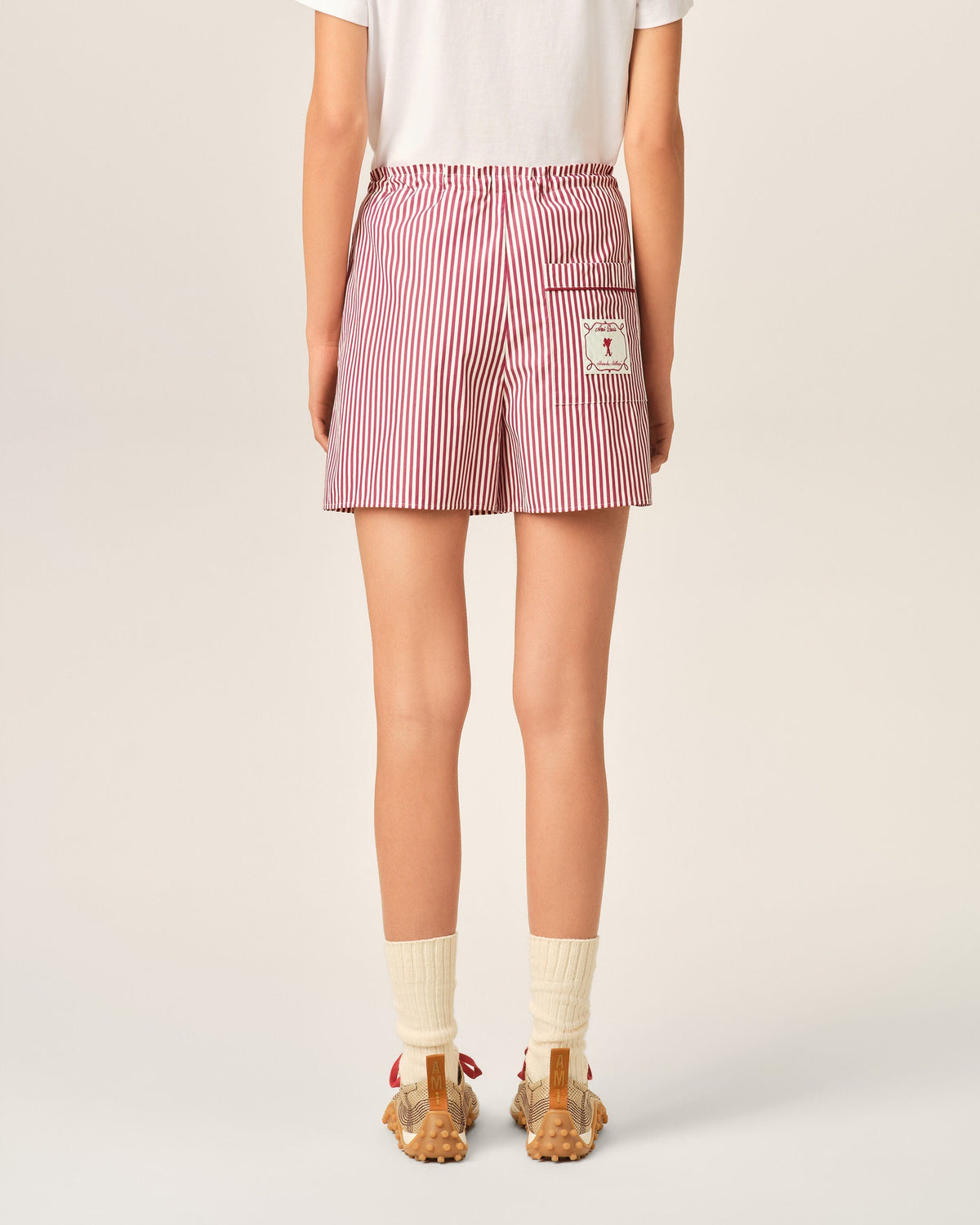 Red striped cotton shorts with Ami de Coeur arrow