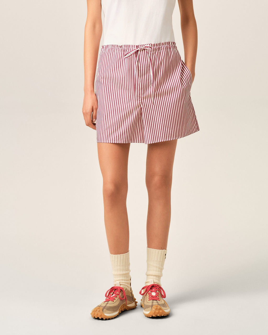 Red striped cotton shorts with Ami de Coeur arrow