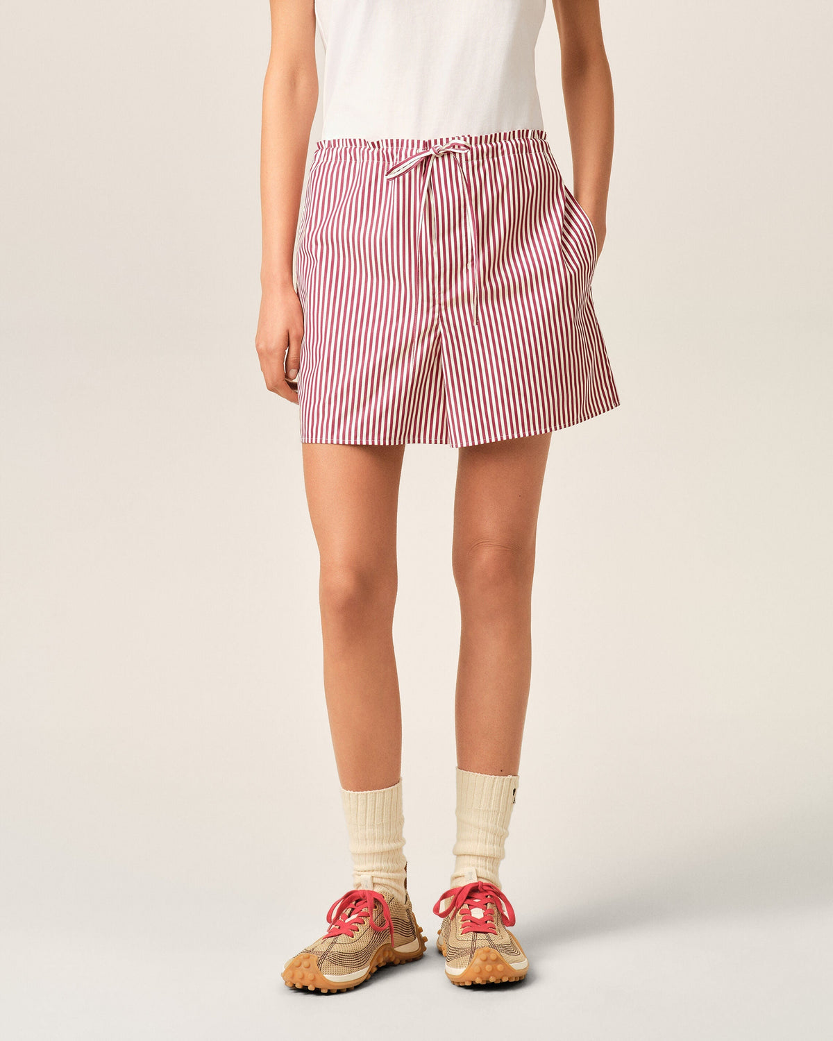Red striped cotton shorts with Ami de Coeur arrow